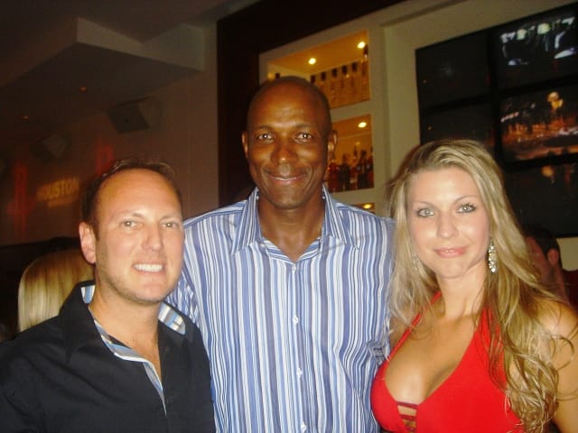 Bruce Coane and former employee, Jamie Gilmore, with NBA player, Clyde Drexler